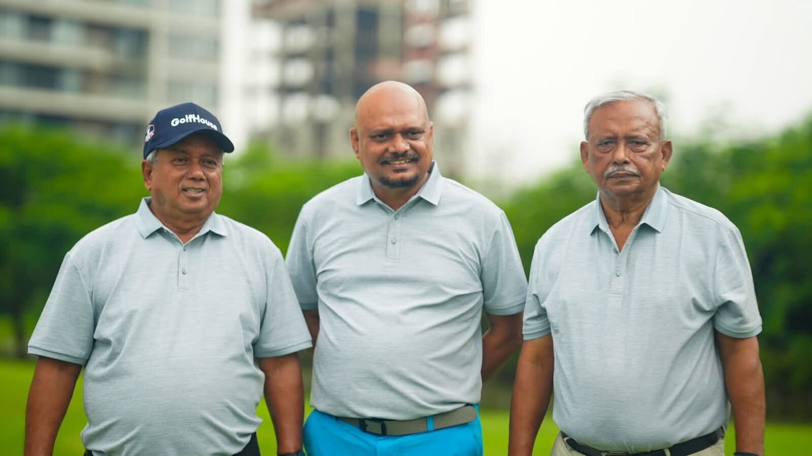 Nazrul Hosen with senior members of the golf community